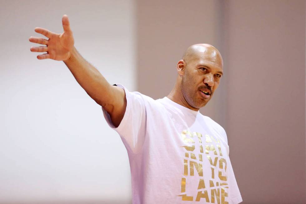 Big Baller Brand AAU team coach LaVar Ball calls out to his players during an Adidas Summer ...