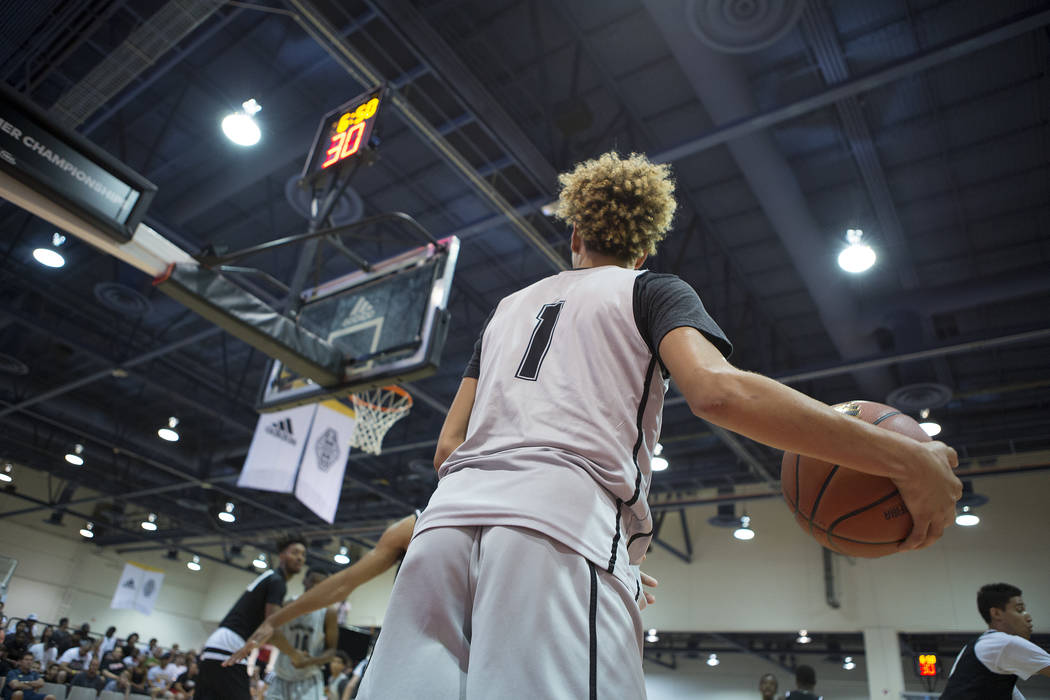 Big Baller Brand player LaMelo Ball prepares to pass during an Adidas Summer Championship AA ...