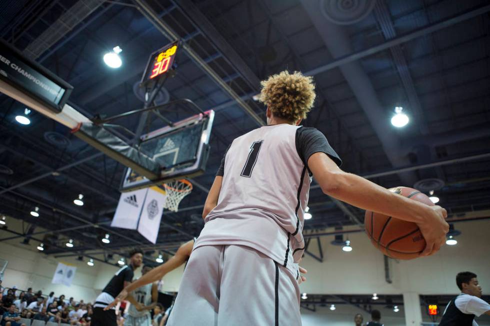 Big Baller Brand player LaMelo Ball prepares to pass during an Adidas Summer Championship AA ...