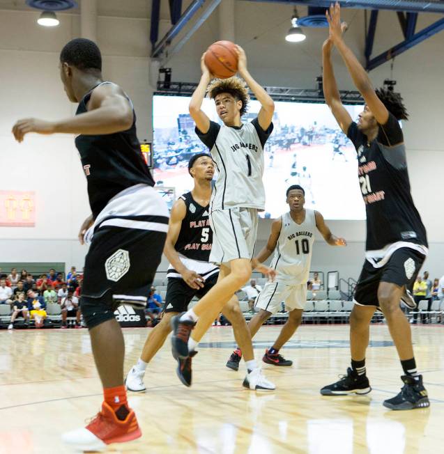 Big Baller Brand player LaMelo Ball passes the ball during an Adidas Summer Championship AAU ...