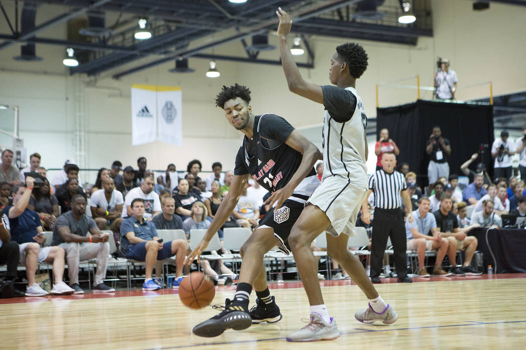 Play Hard Play Smart player Jordan Brown handles the ball during an Adidas Summer Championsh ...