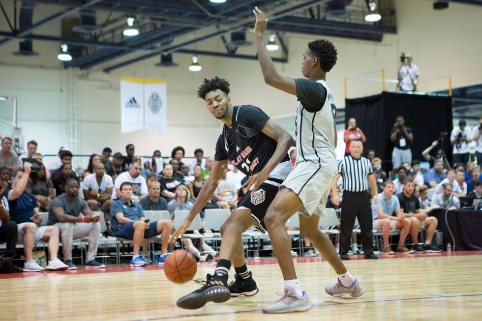 Play Hard Play Smart player Jordan Brown handles the ball during an Adidas Summer Championsh ...