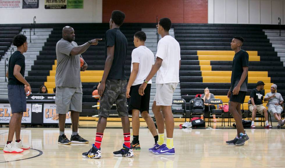 Shaquille O’Neal, left, leads a Cal Supreme practice at Ed W. Clark High School in Las ...