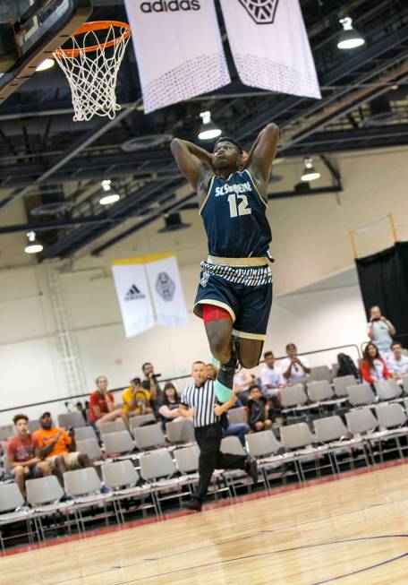 SC Supreme forward Zion Williamson (12) breaks away for a dunk against Play Hard Play Smart ...