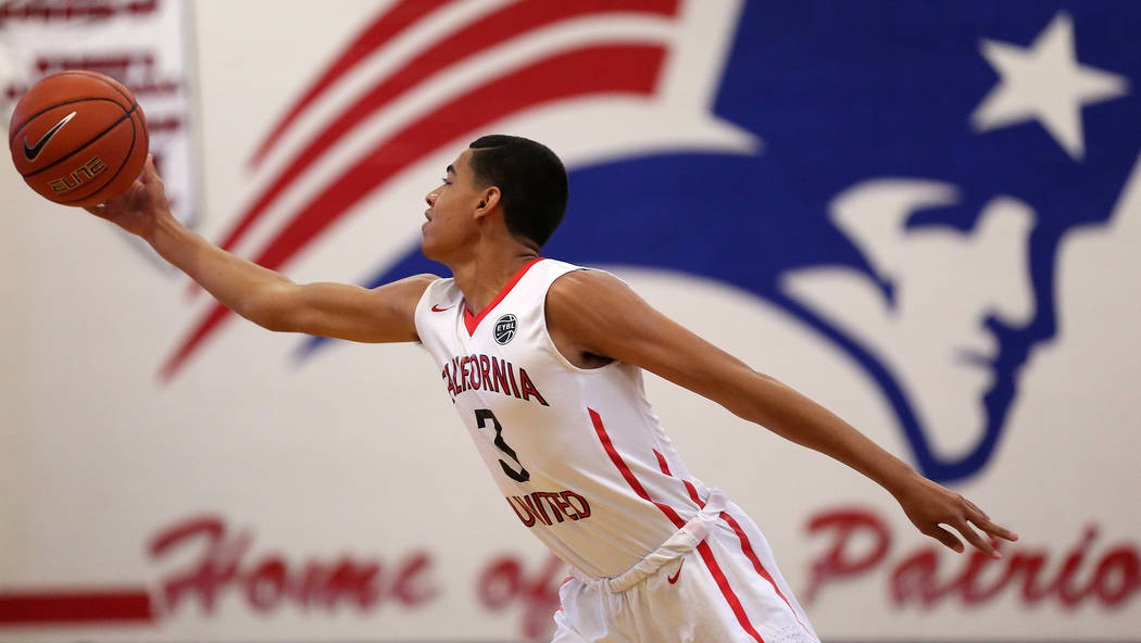 Liberty sophomore and California United player Julian Strawther (3) reaches for the ball dur ...