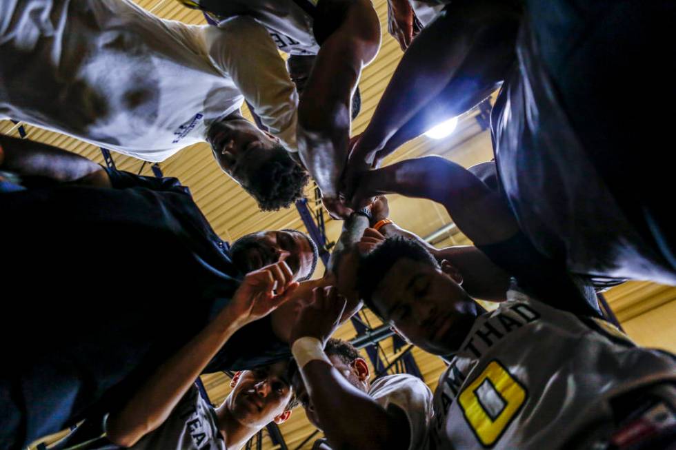 Team Thad comes together in a post-game huddle during the Las Vegas Fab 48 Championship Game ...