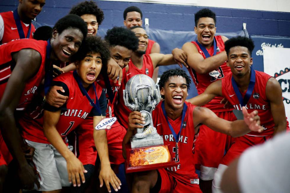 California Supreme Elite players hold their Platinum Elite Championship game trophy after wi ...