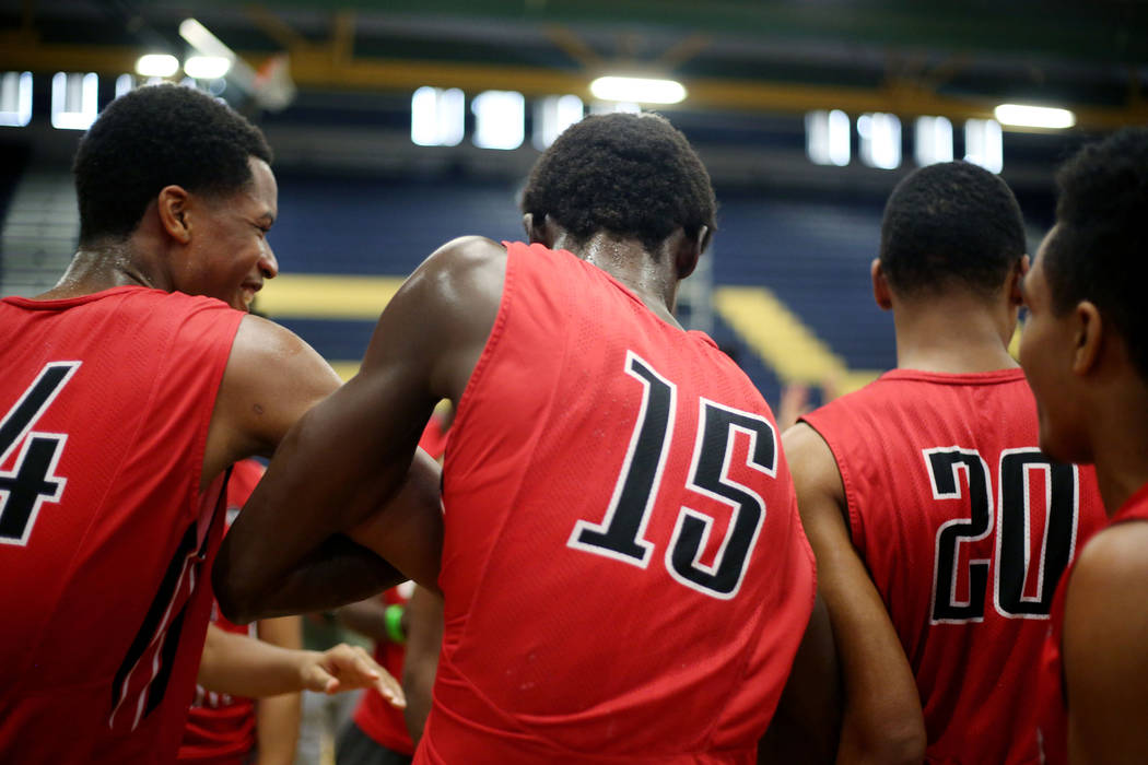 California Supreme Elite’s Shareef OՎeal, 24, left, Fred Odhiambo, 15, center, a ...