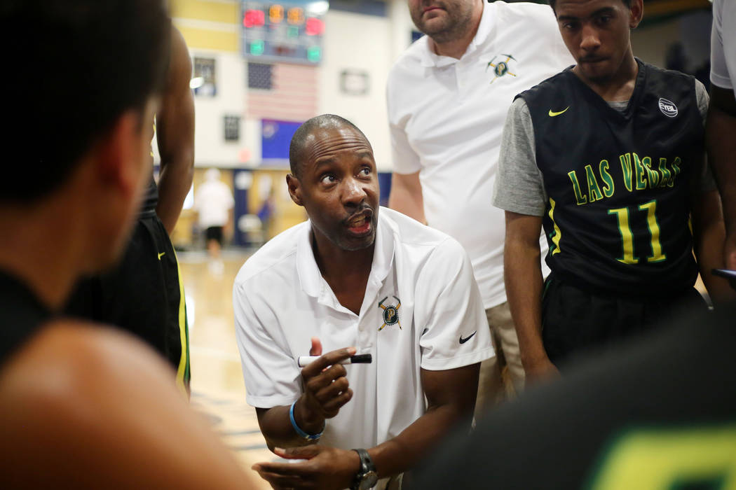 Las Vegas Prospects head coach Derek Thomas speaks with his team during the Platinum Elite C ...