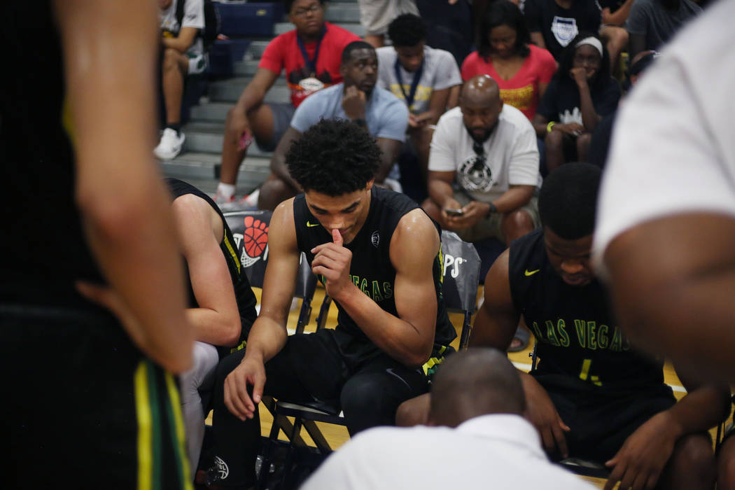 Las Vegas Prospects’ Marvin Coleman II, center, listens in a huddle during the Platinu ...