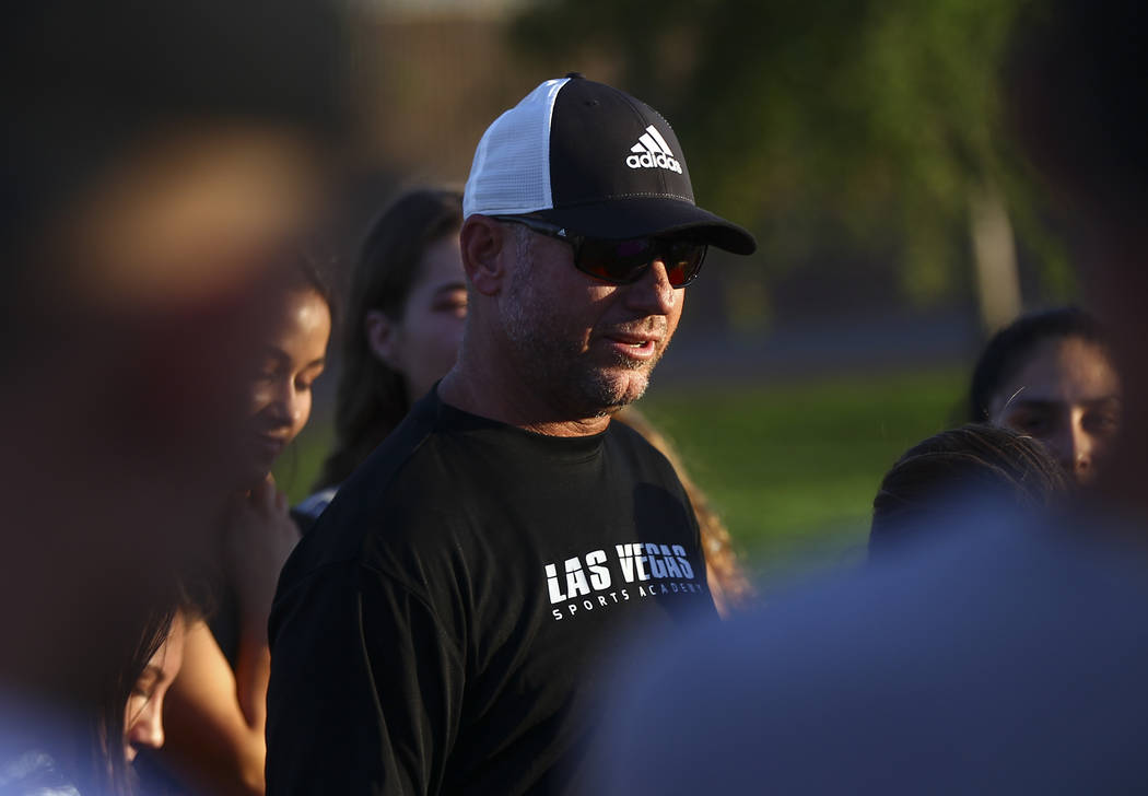 Club soccer coach Doug Borgell speaks during a vigil for Haylei Hughes, a former Cimarron-Me ...