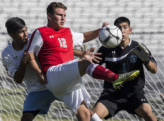 Nicklaus Dongmann (12) is one of seven returning starters for the Aggies. Benjamin Hager/Las ...