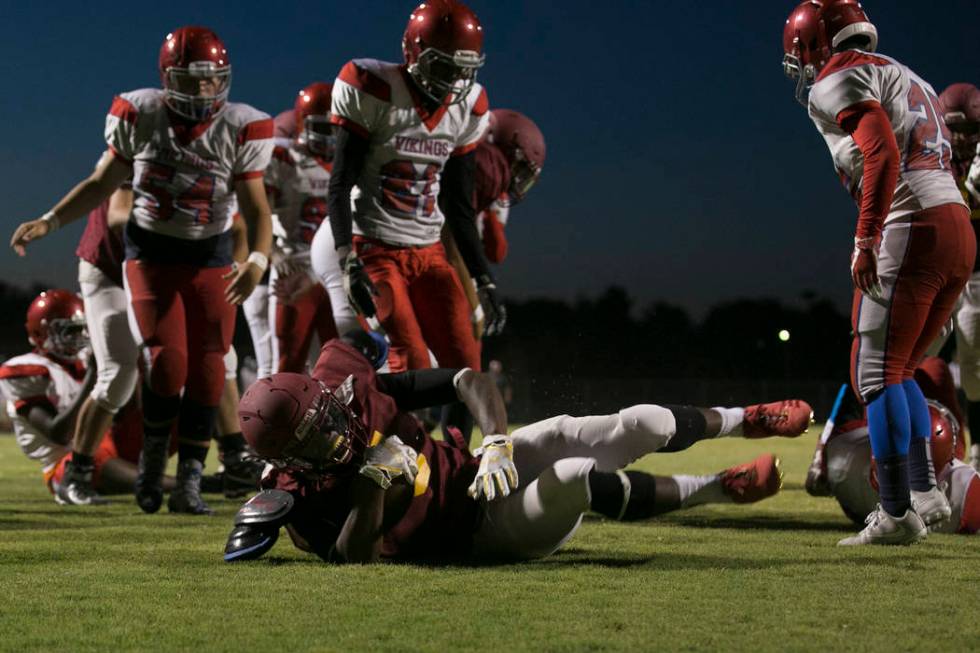 Del Sol senior Taariq Flowers brings the ball to end zone during a three-team scrimmage at D ...