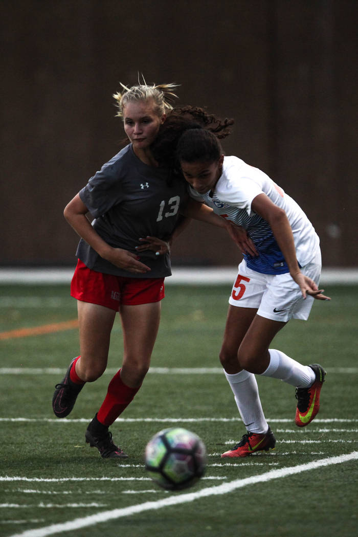 Arbor View High School’s Jaylin Shoning, 13 and Bishop Gorman’s Kenzie Carr, 5, ...