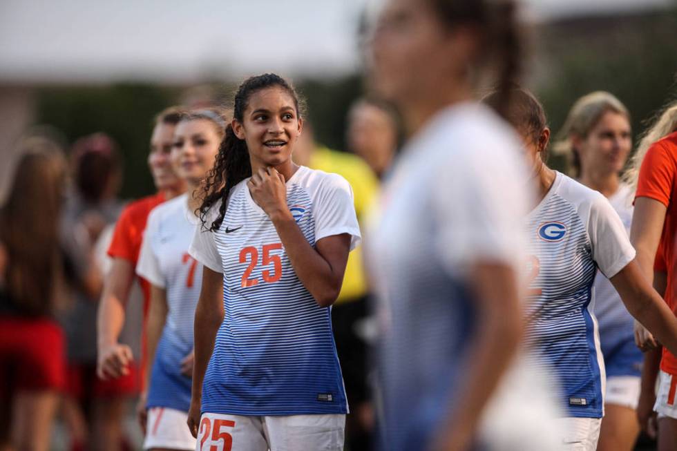 Bishop Gorman’s Samantha Nieves, 25, smiles after beating Arbor View 4-3 at Bishop Gor ...