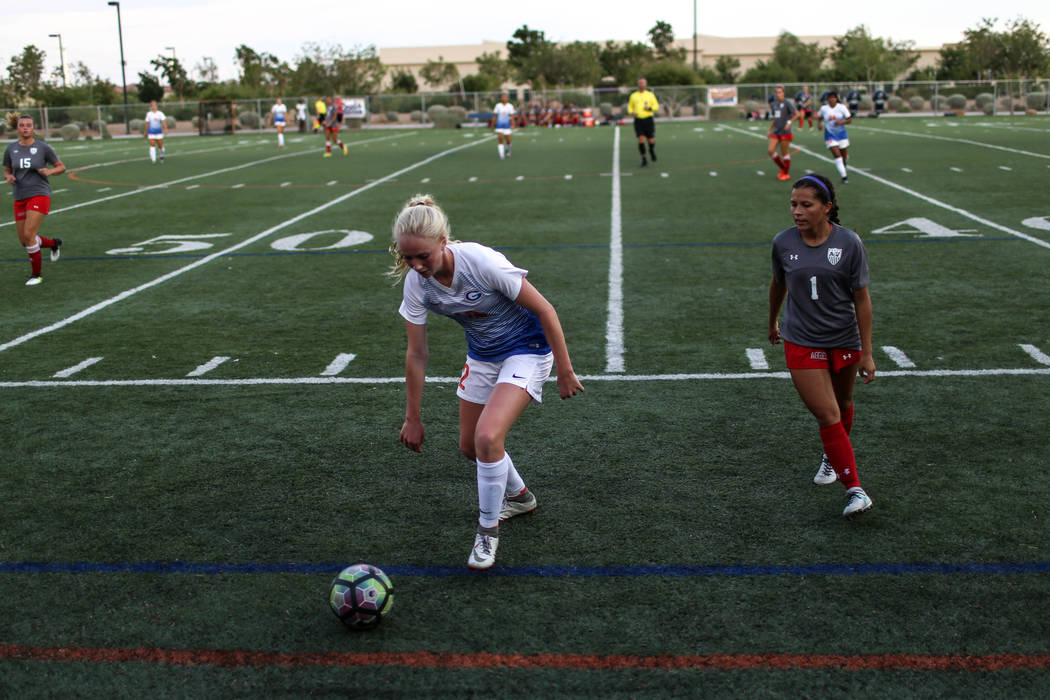 Bishop Gorman’s Kevyn Hillegas, 12, lunges to grab a ball before a throw-in during a g ...