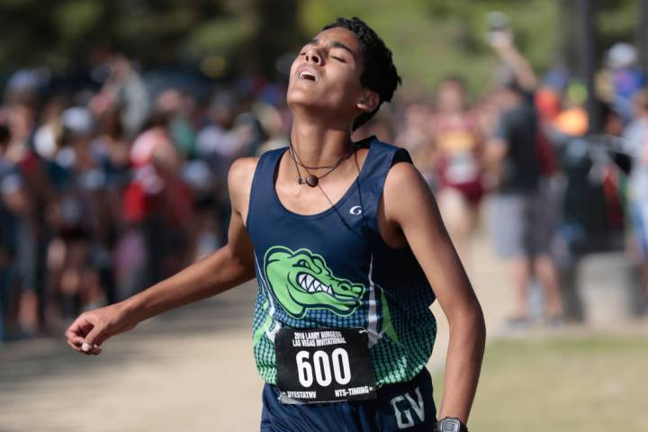 Green Valley’s Milton Amezcua (600) shows exhaustion on his face as he crosses the fin ...