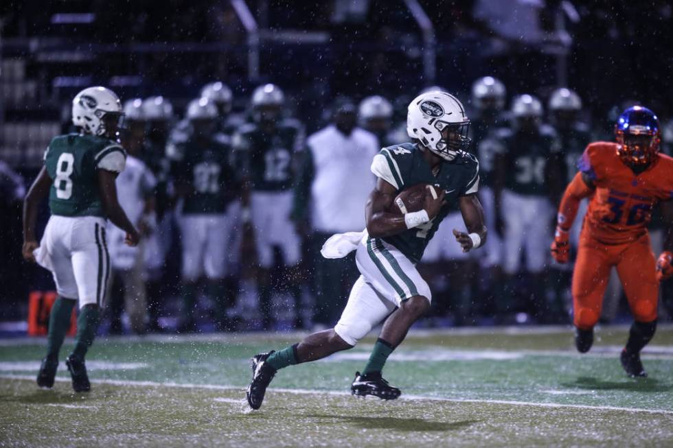 Miami Central’s James Cook (4) runs past Bishop Gorman during the first quarter at Bis ...