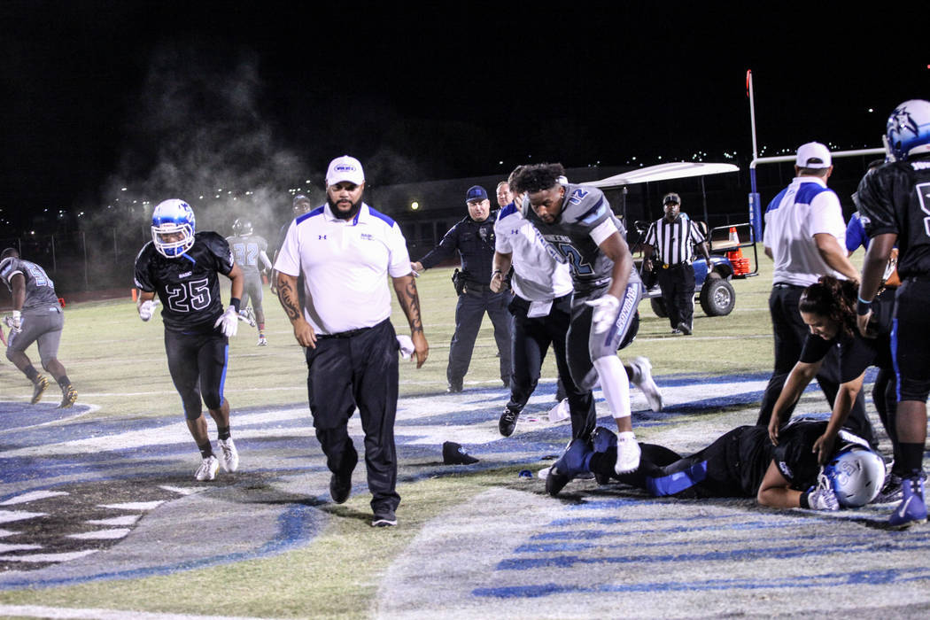 Police use pepper spray to disperse a fight between Canyon Springs and Basic football teams ...