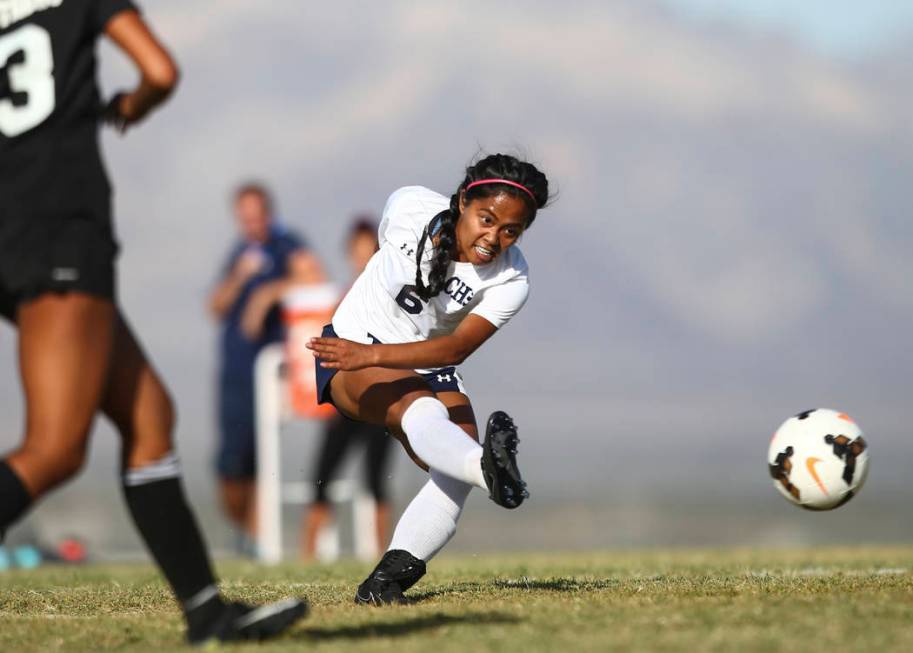 Centennial’s Dona Acierto (6) kicks the ball against Palo Verde during a soccer game a ...