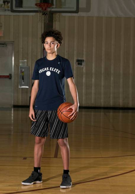 Vegas Elite point guard Richard Isaacs, 14, on the court before a workout session at the Bil ...