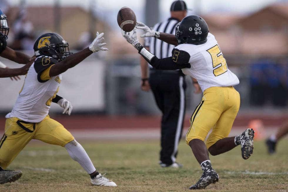 Clark’s Isaiah Veal (5) reaches for a dropped pass against Sierra Vista in their footb ...