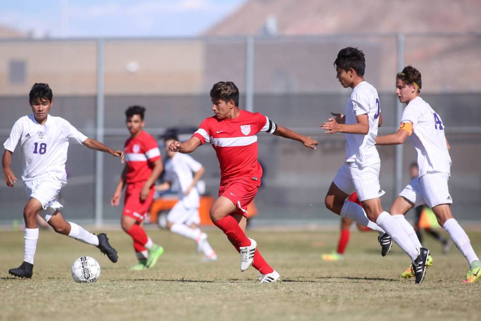 Western player Juan Arredondo-Alvarez (5) dribbles the ball during a game against Sunrise Mo ...