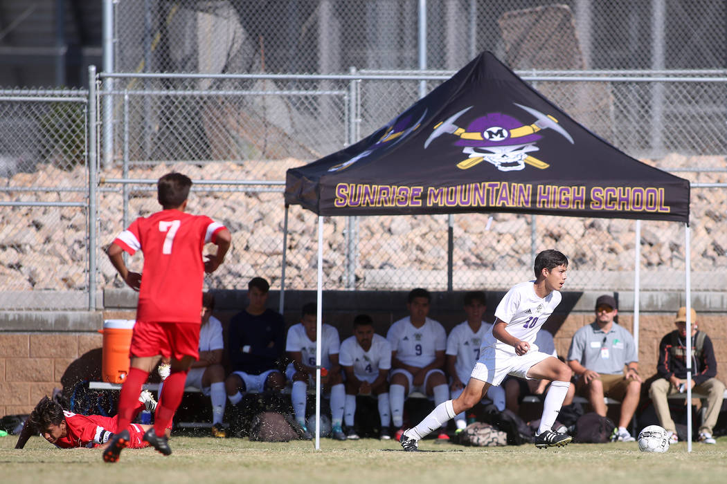 Sunrise Mountain player Angel Arreola (10) steals the ball from Western during a game at Sun ...