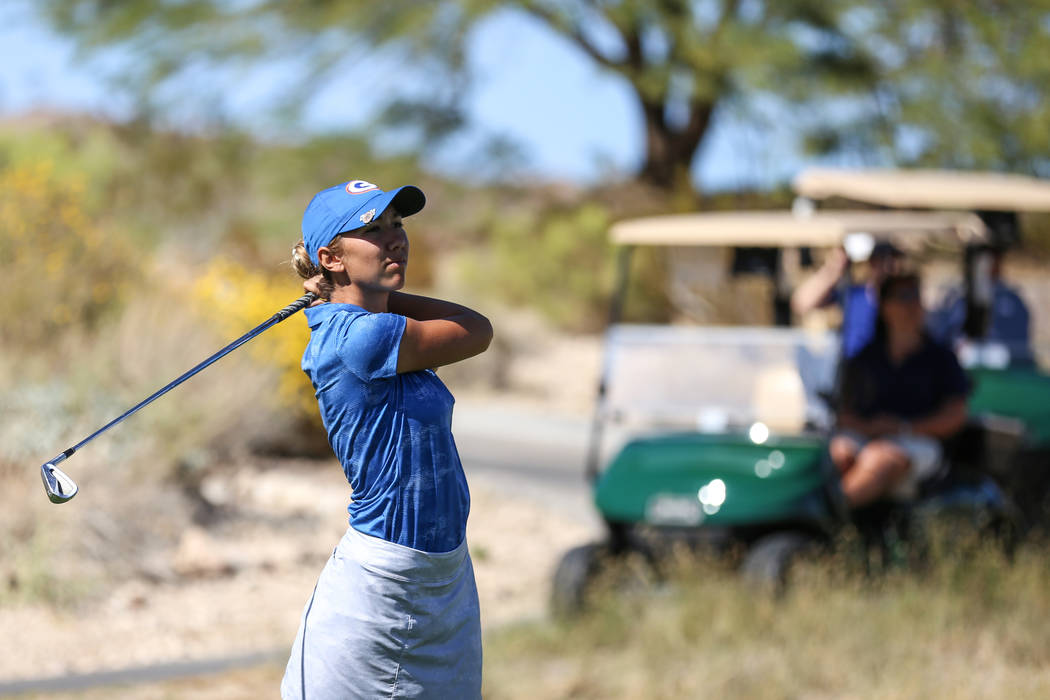 Bishop Gorman’s Hunter Pate swings during the Class 4A Sunrise and Sunset Region girls ...