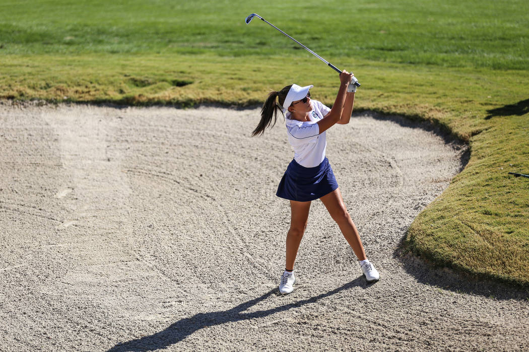 Centennial’s McKenzi Hall swings during the Class 4A Sunrise and Sunset Region girls g ...