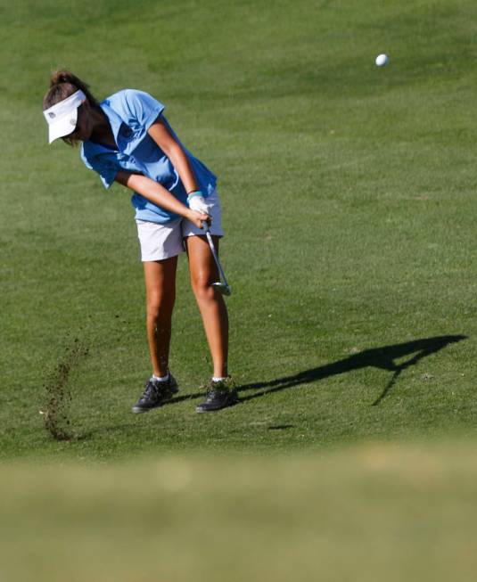 Centennial’s McKenzi Hall swings during the Class 4A state girls golf tournament at Hi ...