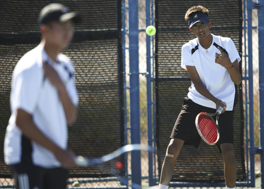 Clarkճ Simran Shah, right, and Michael Pasimio compete against Desert Oasis in the Cla ...