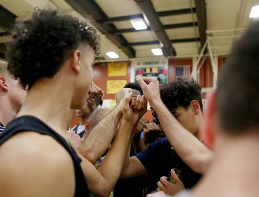 Players on the Clark High School basketball team break for basketball practice at Clark High ...