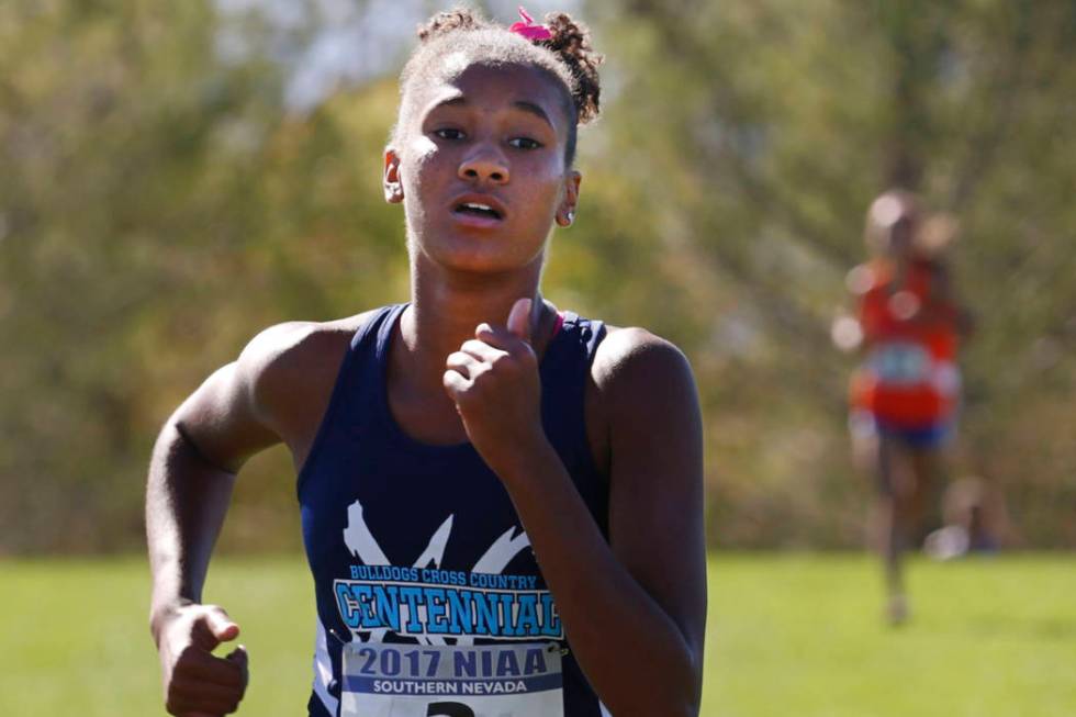 Centennial’s Alexis Gourrier (2) competes during the Girls Cross Country Class 4A Suns ...