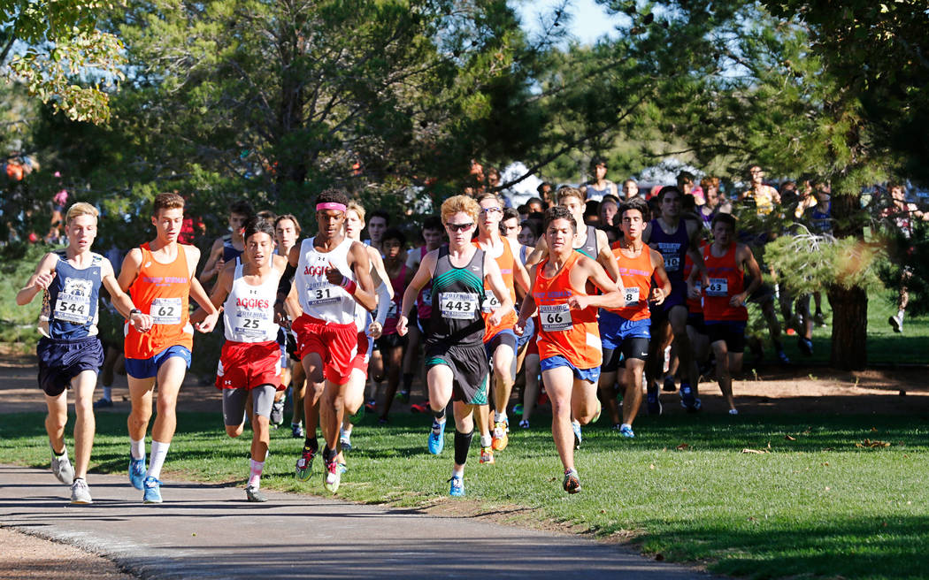 Runners compete during the Boys Cross Country Class 4A Sunset Region race in Boulder City, F ...