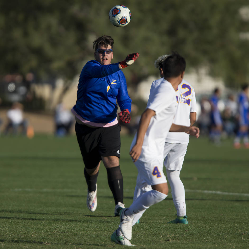 Durango’s Nikolas Todorovich (1) throws the ball to a teammate in the playoff soccer g ...