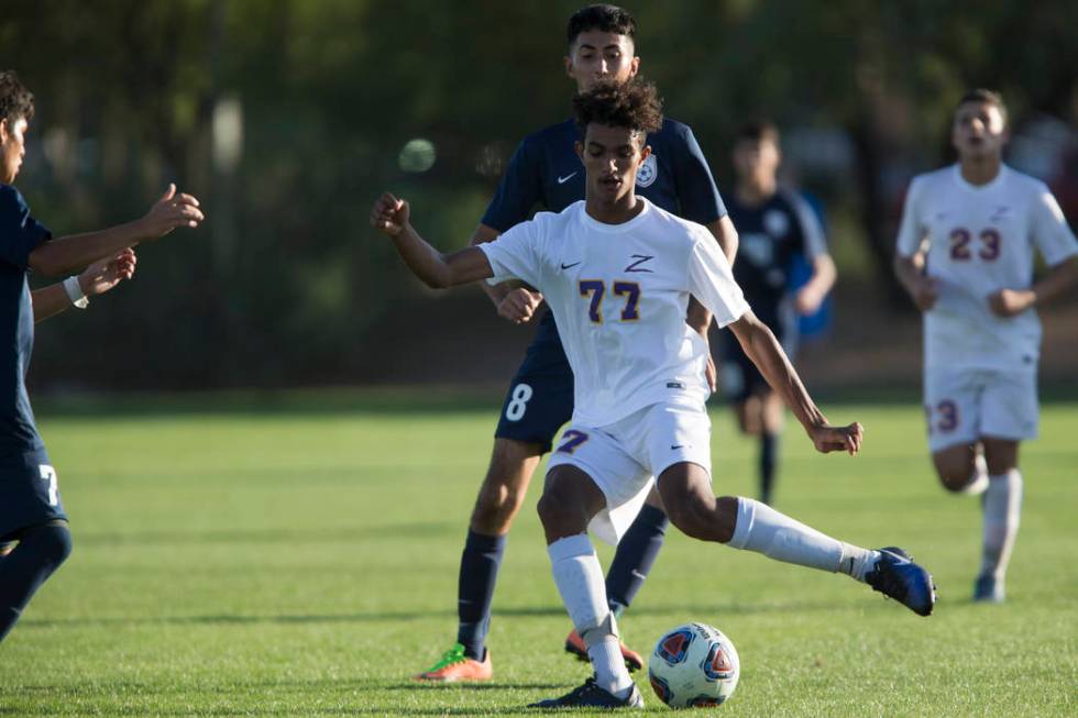 Durango’s William Hailu (77) gets ready to make a pass in the playoff soccer game agai ...