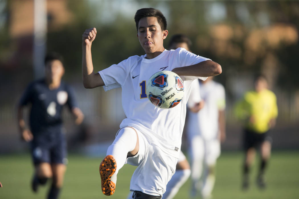 Durango’s Christopher Bramasco (1) runs to the ball in the playoff soccer game against ...