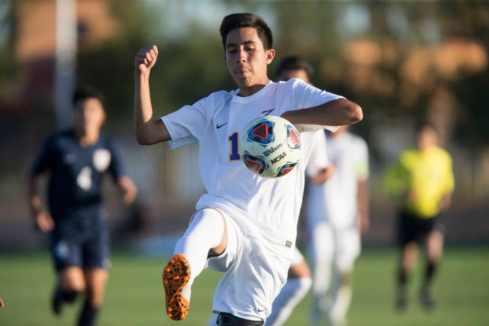 Durango’s Christopher Bramasco (1) runs to the ball in the playoff soccer game against ...