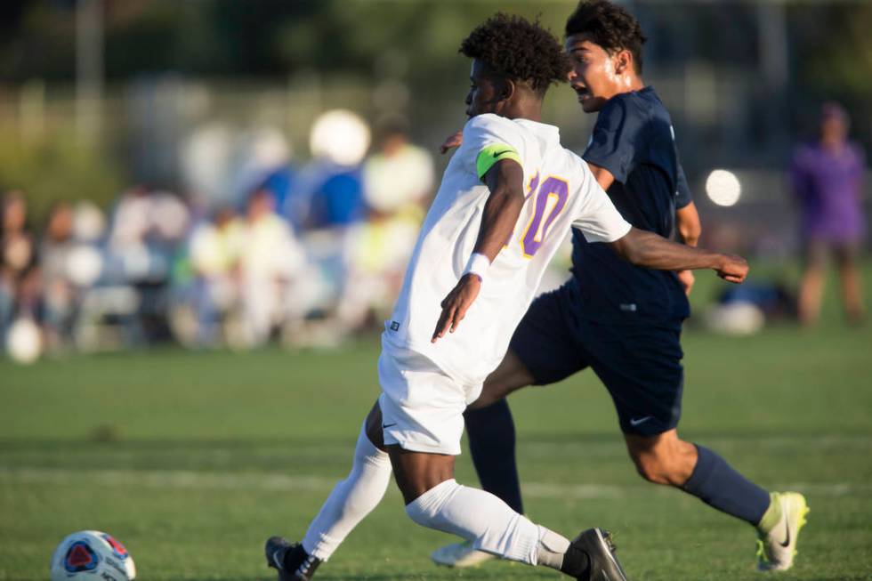 Durango’s Mihreteab Tesfamariam (10) kicks the ball for a goal in the playoff soccer g ...