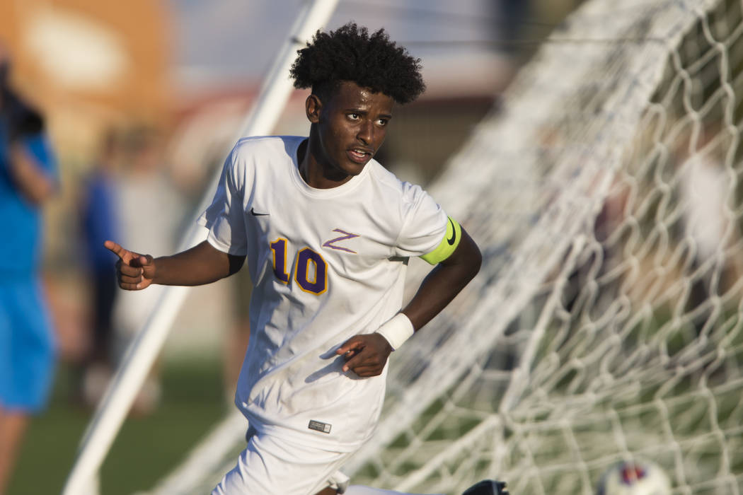 Durango’s Mihreteab Tesfamariam (10) celebrates a goal in the playoff soccer game agai ...