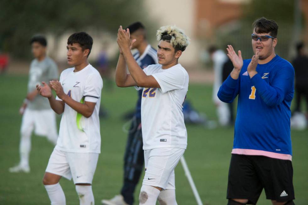 Durango’s Gael Delangel-Parra (4), Cristian De Leon Morales (22) and Nikolas Todorovic ...