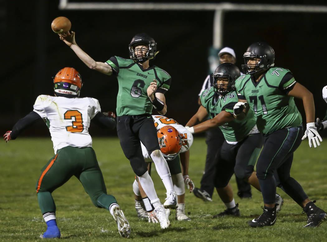 Virgin Valley’s Cade Anderson (6) throws a pass during the Class 3A state quarterfinal ...