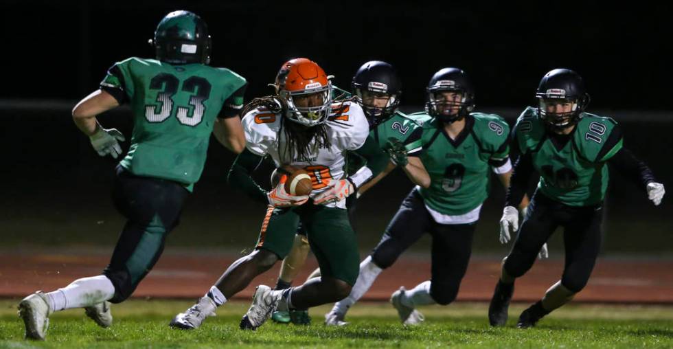 Mojave’s Noah Thompson (10) looks to get past Virgin Valley defense during the Class 3 ...