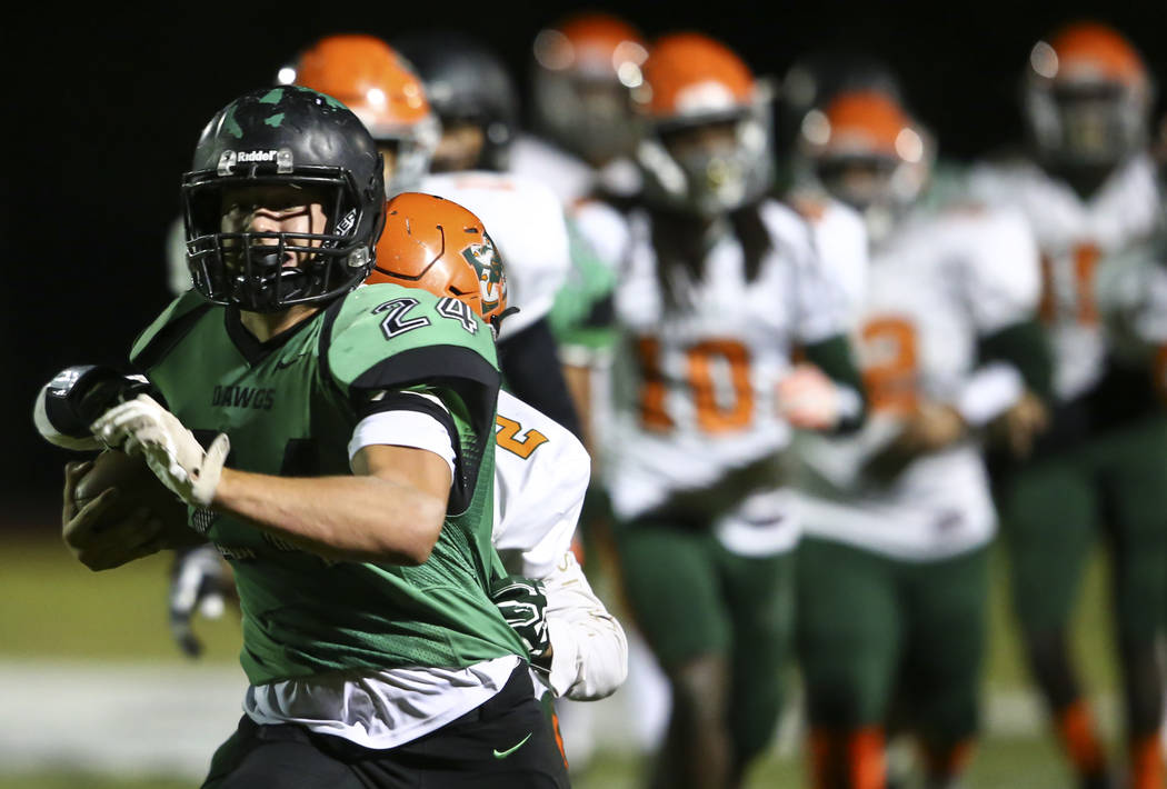 Virgin Valley’s Cresent Crandall (24) runs the ball against Mojave during the Class 3A ...