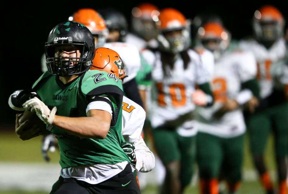 Virgin Valley’s Cresent Crandall (24) runs the ball against Mojave during the Class 3A ...