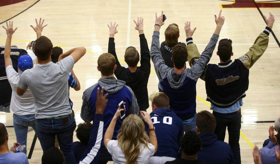 Shadow Ridge fans cheer as their team plays Coronado during the Class 4A state volleyball ga ...