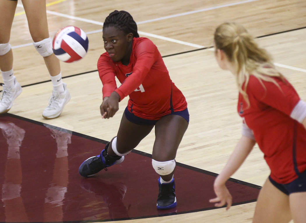 Coronado’s Morenike Ajayi (4) sends the ball to Shadow Ridge during the Class 4A state ...