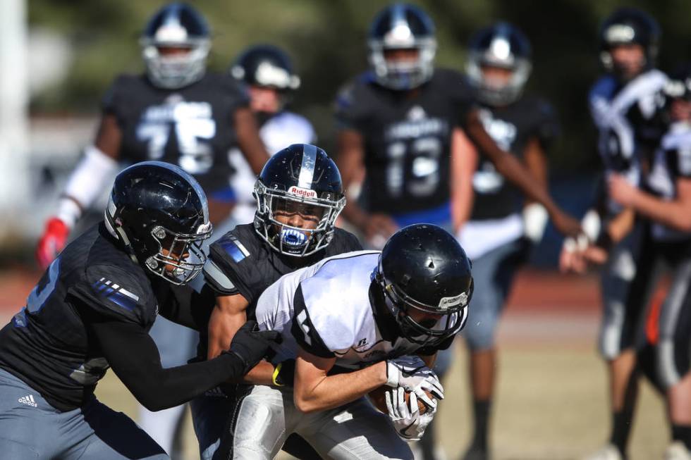 Spring Creek’s Dakota Larson (4) catches a pass during the first quarter of the Class ...