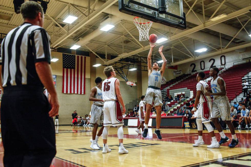 Canyon SpringsՠKayvon Alexander (11), center, shoots the ball during the third quarter ...